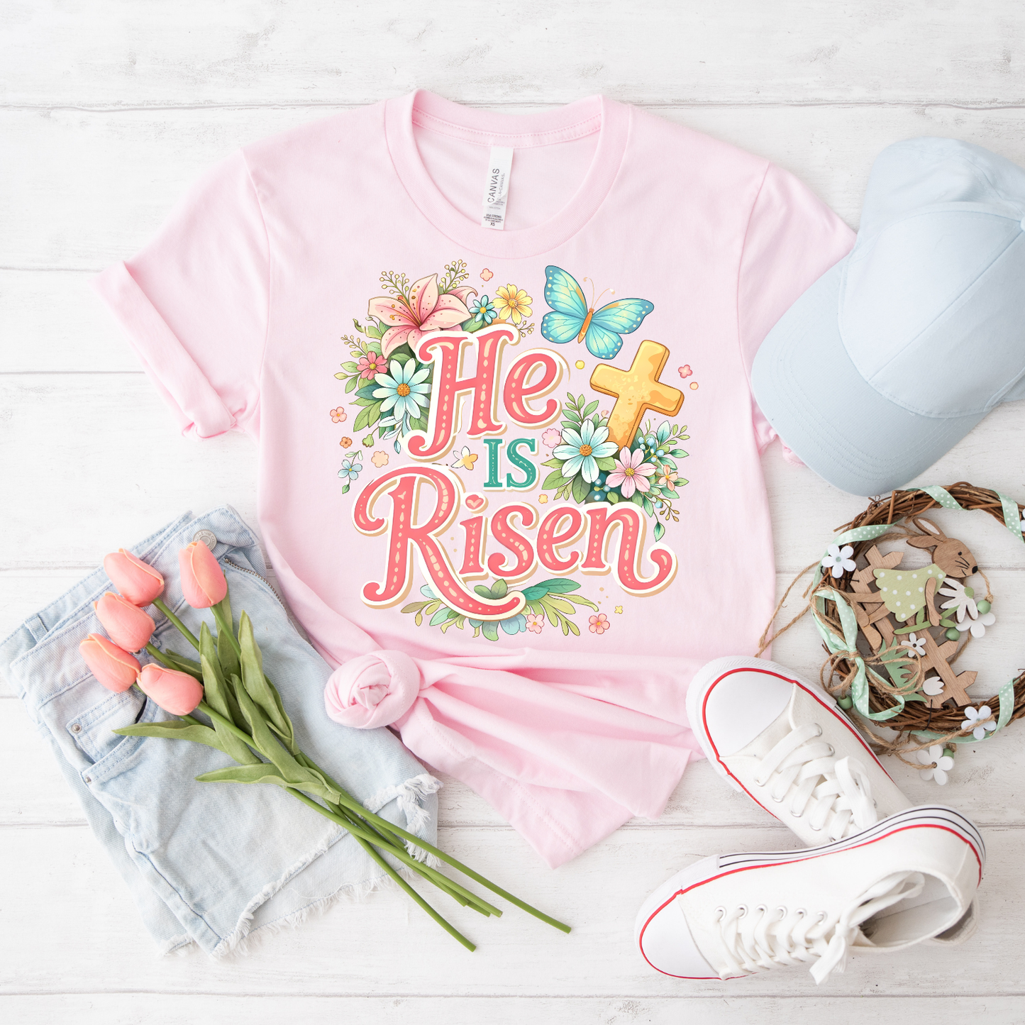 He Is Risen Floral Tee — Easter Christian T-Shirt with Cross & Butterfly