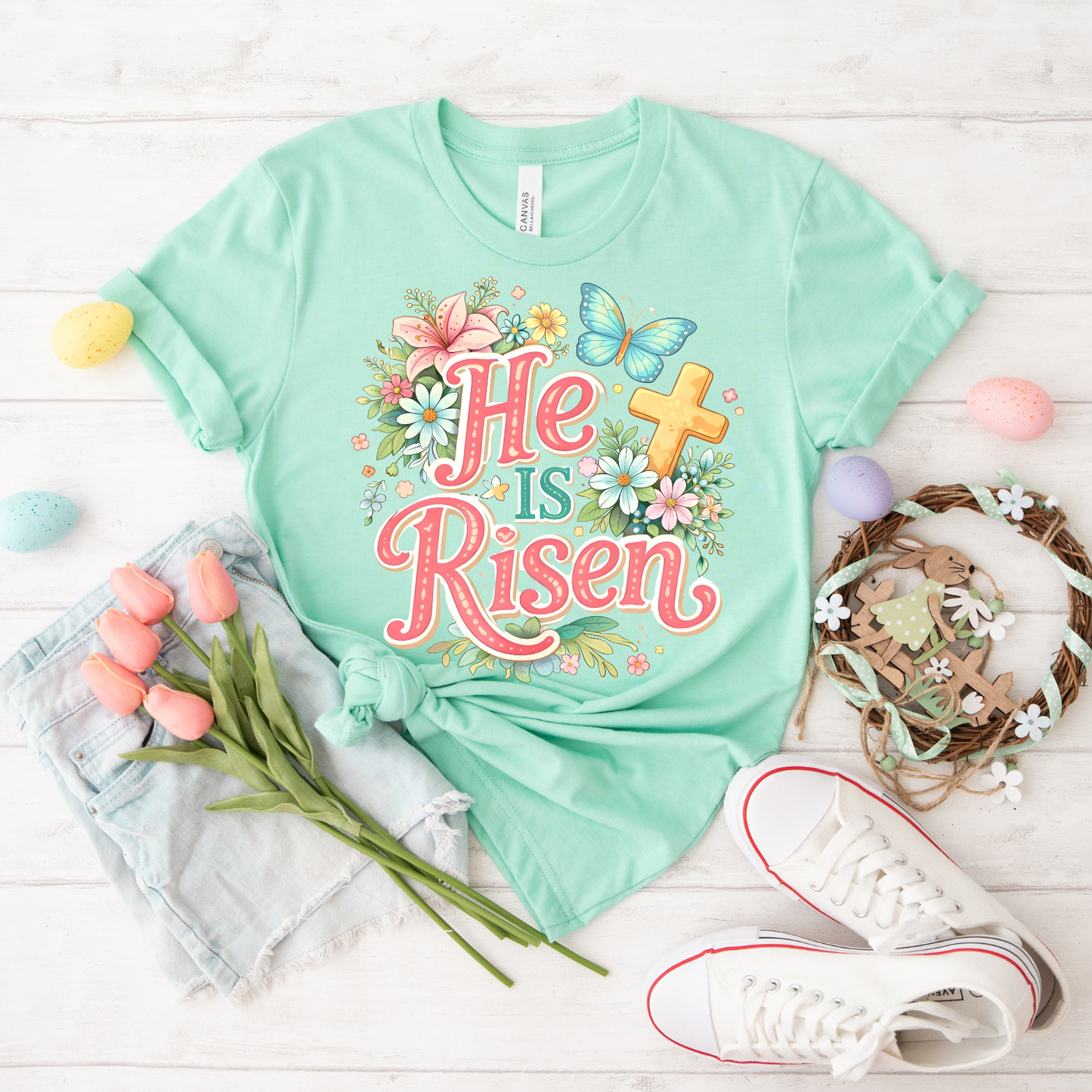 He Is Risen Floral Tee — Easter Christian T-Shirt with Cross & Butterfly